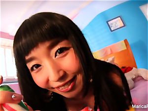 chinese starlet Marica Hase plays with candy knob