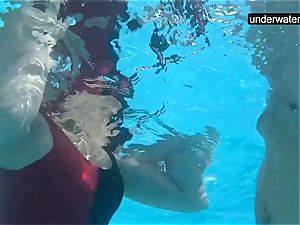 sunk underwater with a man rod inside her